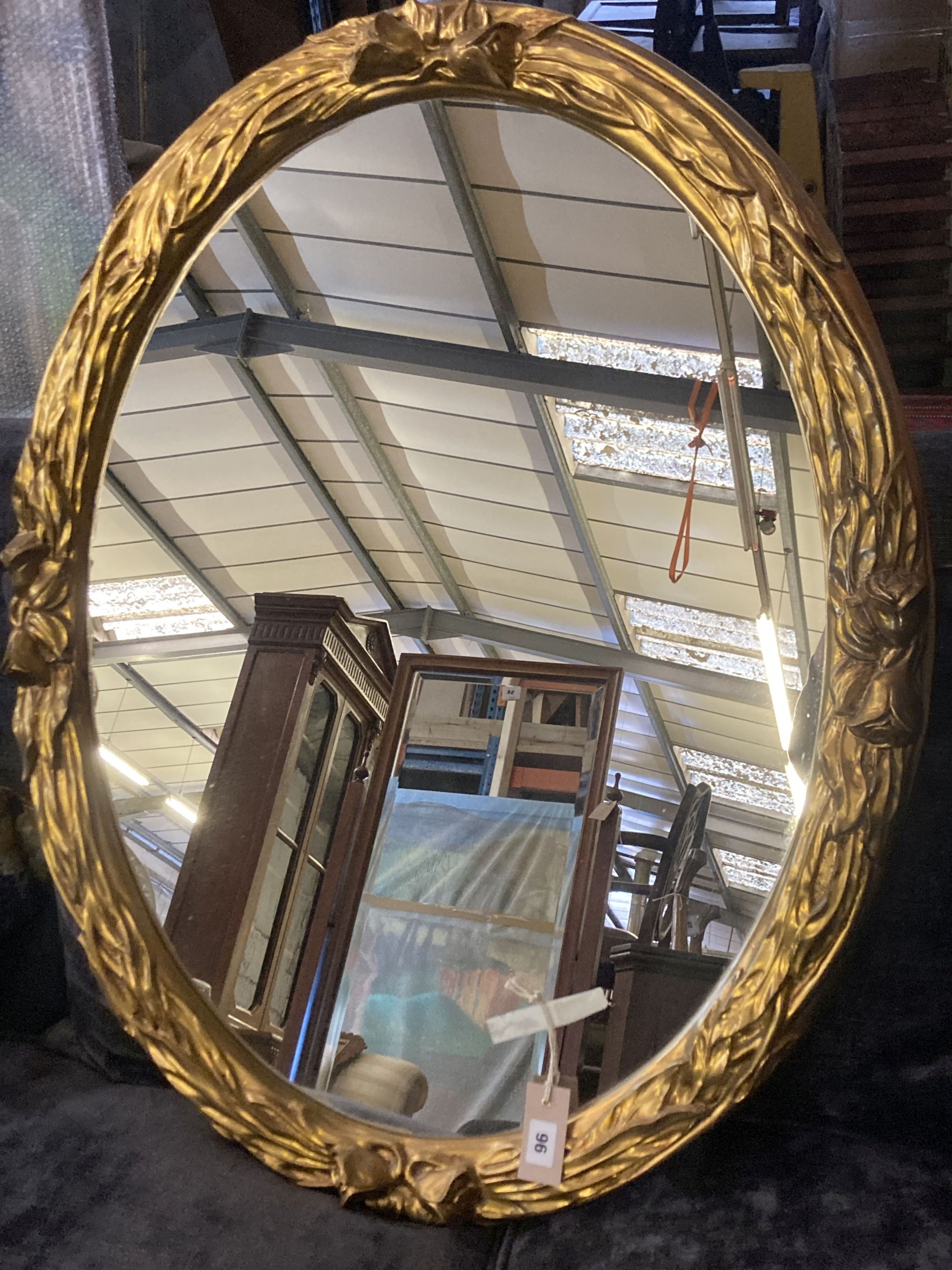 A Victorian style oval gilt framed wall mirror, width 75cm, height 94cm